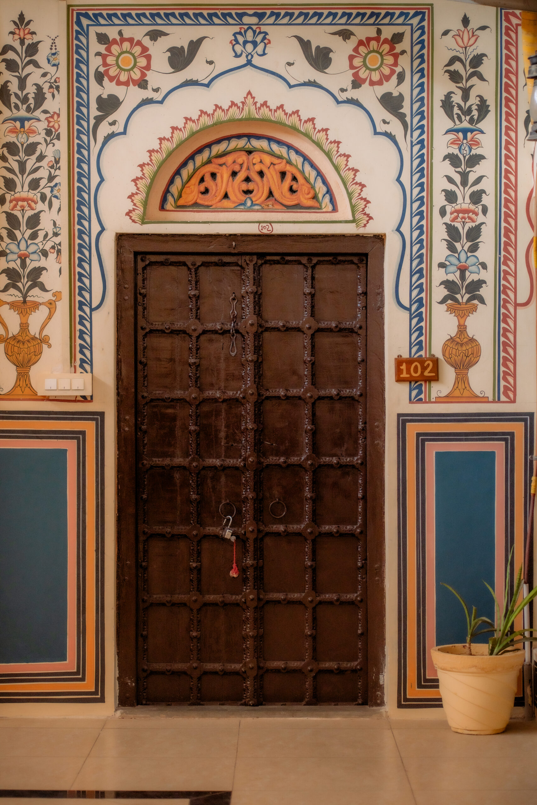 Carved sandstone facade of The Shahi Palace Mandawa